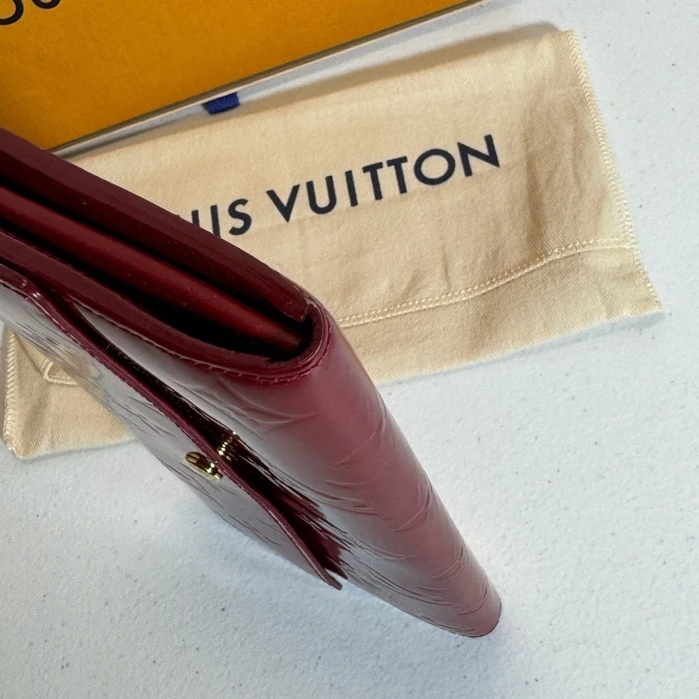 AUTHENTIC Louis Vuitton Red Wallet with Monogram Embossing